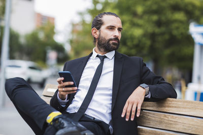 Young man using mobile phone