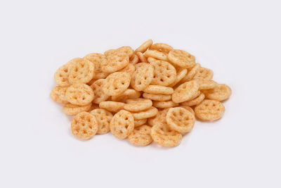 Close-up of cookies against white background