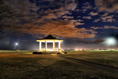 Built structure against sky in city at night