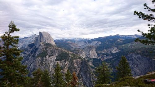View of trees and rocky mountains