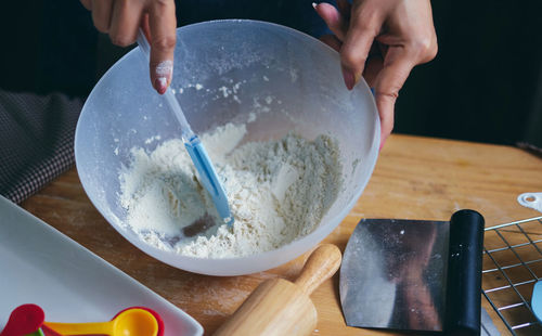 High angle view of person preparing food on cutting board