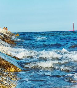 Scenic view of sea against clear sky