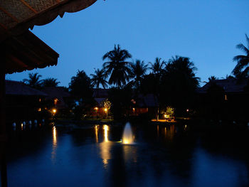 Reflection of illuminated buildings in water