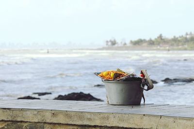 Close-up of bucket against blurred background