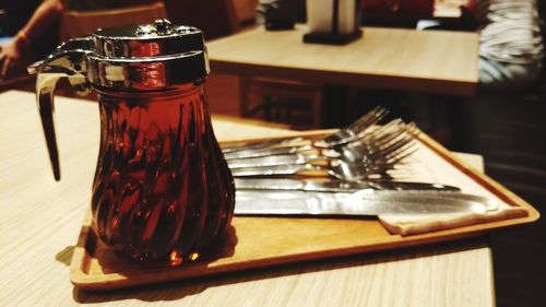 Close-up of drink in jar on table