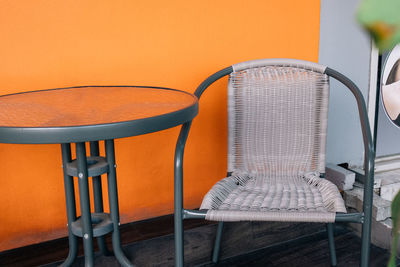 Close-up of empty chairs on table at home