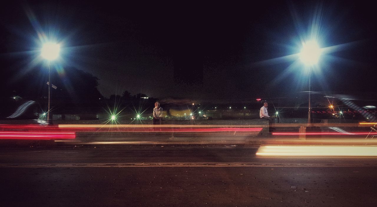 illuminated, night, transportation, road, light trail, long exposure, street, motion, street light, speed, car, land vehicle, road marking, blurred motion, mode of transport, lighting equipment, on the move, city street, city, traffic