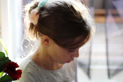 Close-up of woman looking at camera