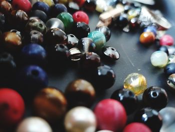 Close-up of multi colored candies on table