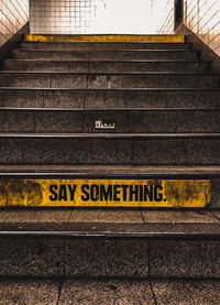 Text on railroad station platform