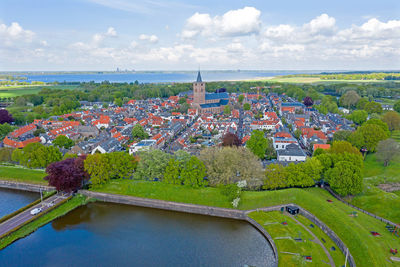 High angle view of townscape against sky in city