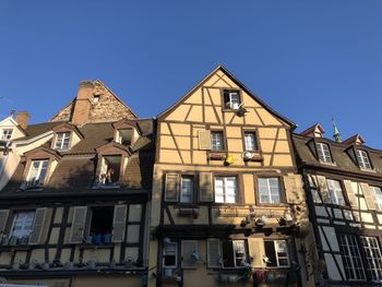 Low angle view of residential building against sky