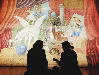 Rear view of people at temple