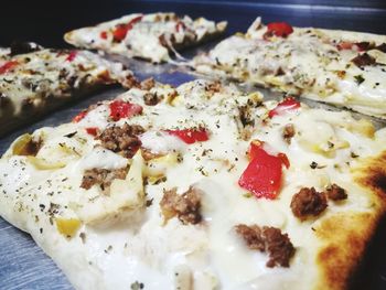 Close-up of pizza served on plate