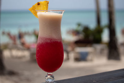 Close-up of drink on glass table