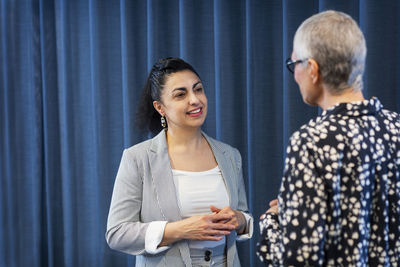 Businesswomen talking together