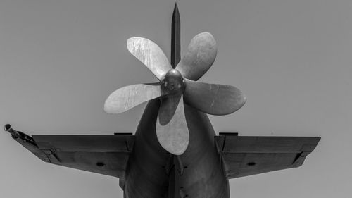 Low angle view of propeller against sky