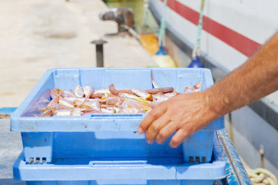 Midsection of man preparing food