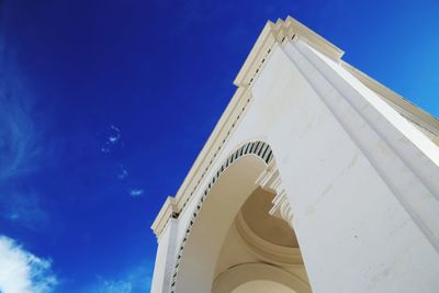 Low angle view of building against blue sky