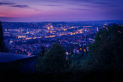 High angle view of illuminated buildings at night