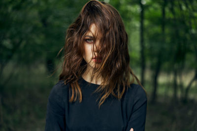 Side view of young woman looking away