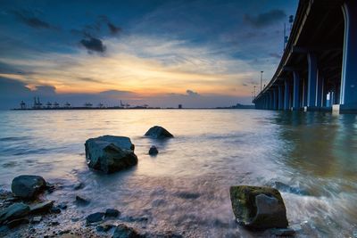 Scenic view of sea against sky during sunset