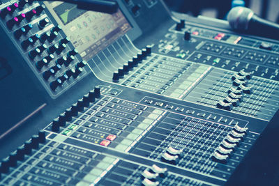 High angle view of sound mixer in nightclub