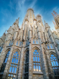 Low angle view of sagrada familia, barcelona. sky, architecture, cathedral.