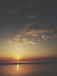 Scenic view of sea at sunset