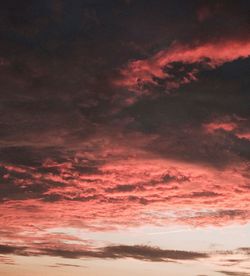 Scenic view of cloudy sky at sunset