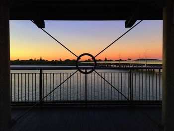 Built structure against sky at sunset