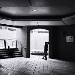 Full length of man standing in building