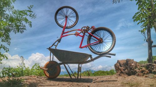 Low angle view of bicycle against trees