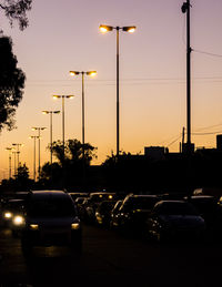 Cars on street at dusk