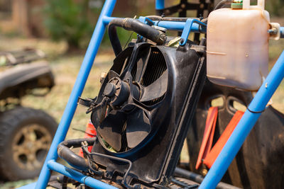 Radiator fan modified car buggy car mounted on the rear of the car.