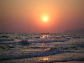 Scenic view of sea at sunset