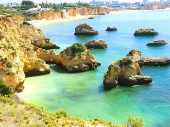 Scenic view of rocks in sea