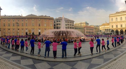 Tourists in front of building