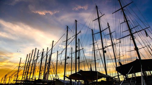 Low angle view of built structure against sunset sky