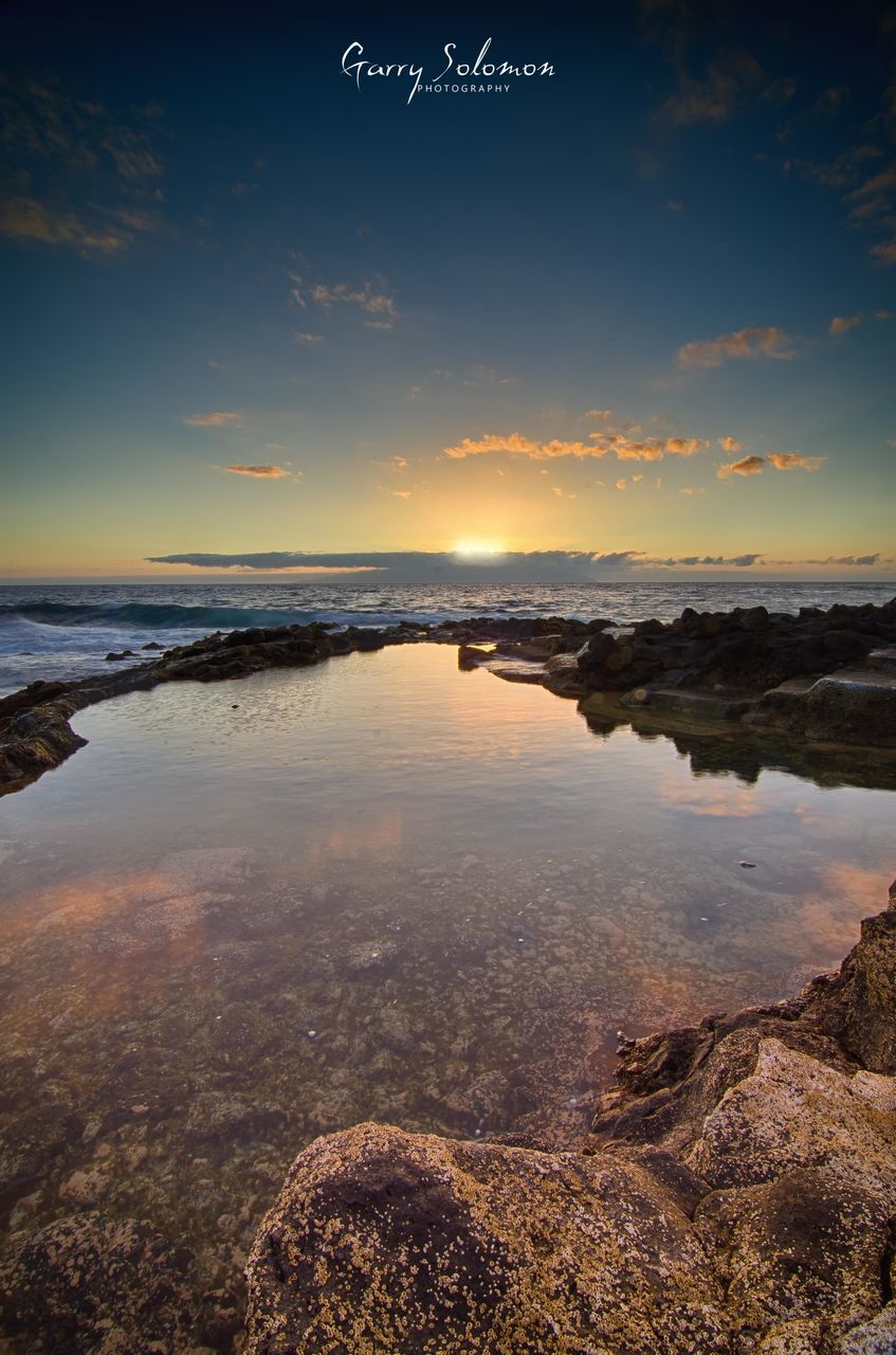 water, sea, beach, scenics, tranquil scene, horizon over water, tranquility, sunset, sky, beauty in nature, shore, nature, reflection, idyllic, coastline, rock - object, cloud - sky, sand, dusk, outdoors