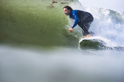 Man surfing in rhode island summer