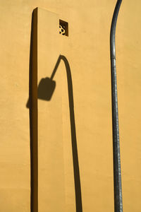 Close-up of street lamp and shadow 