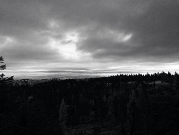 View of storm clouds over landscape