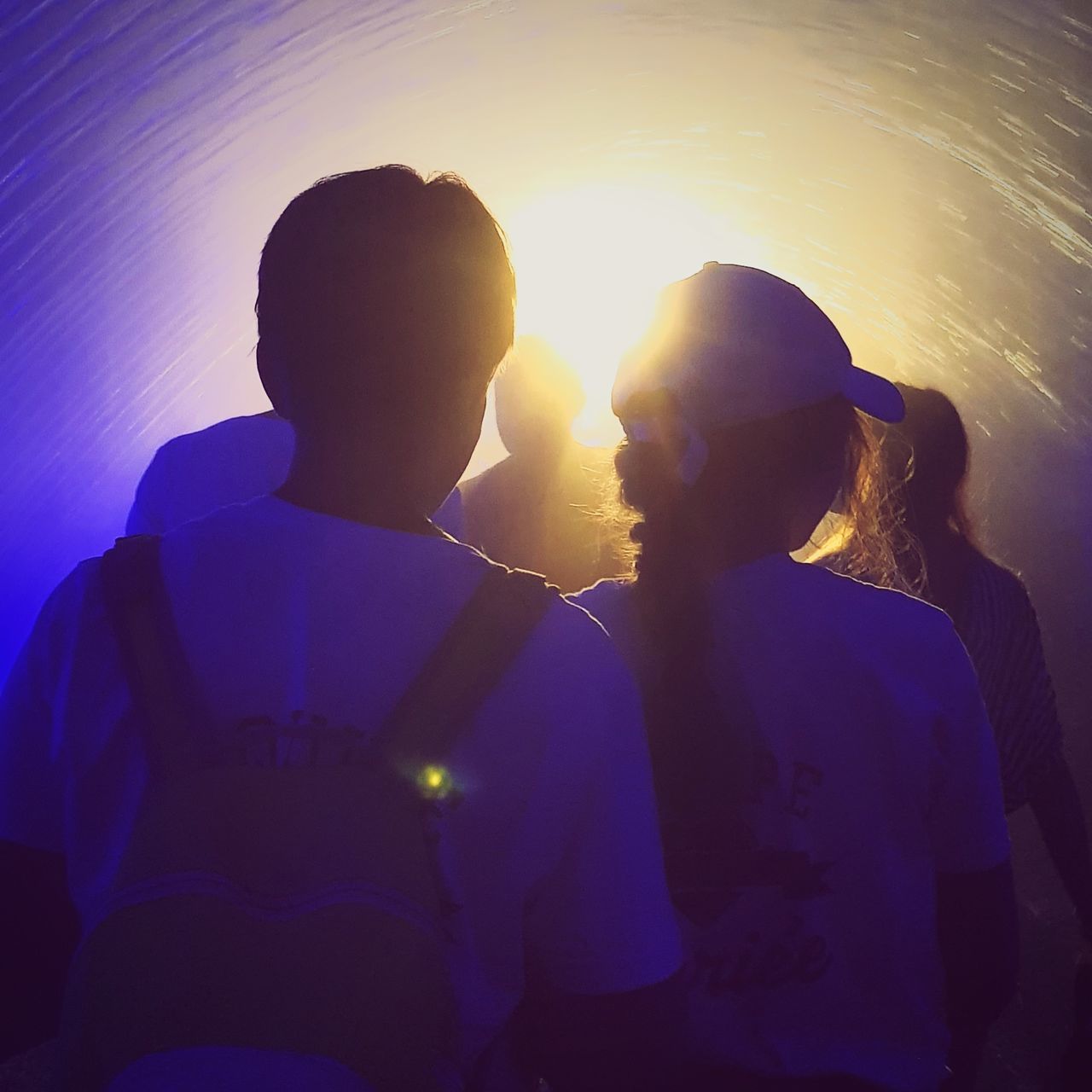 two people, couple - relationship, togetherness, bonding, love, romance, men, positive emotion, real people, women, emotion, lifestyles, heterosexual couple, adult, leisure activity, connection, young men, sky, sunset, kissing, lens flare