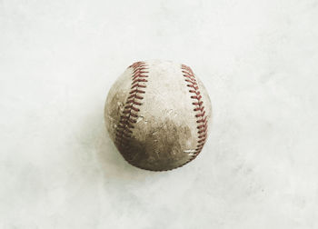 High angle view of baseball ball on white background