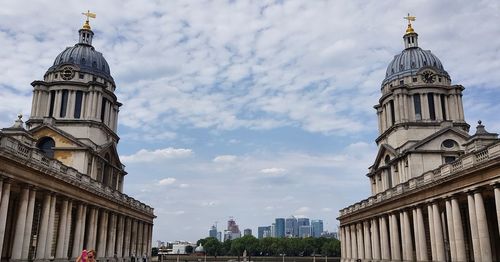 View of buildings in city against sky