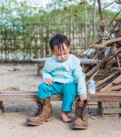 Full length of boy playing outdoors