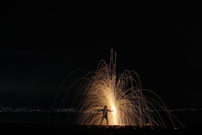 Firework display at night