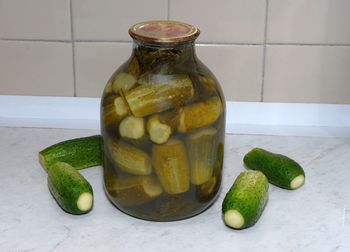 High angle view of fruits in jar on table