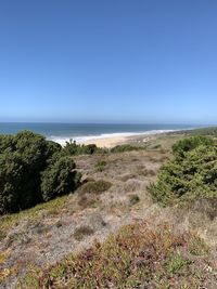 Scenic view of sea against clear sky